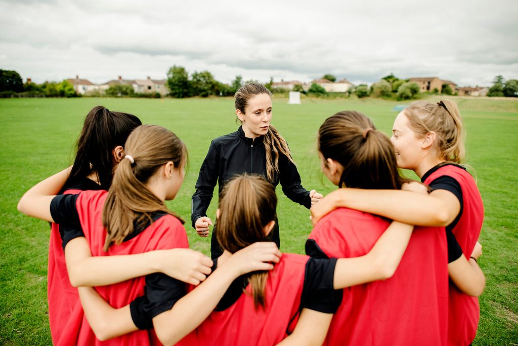 female-coach-rugby-girls_1236519469